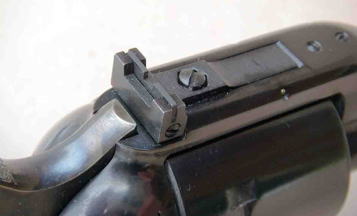 The rear sight is fully adjustable for windage and elevation.